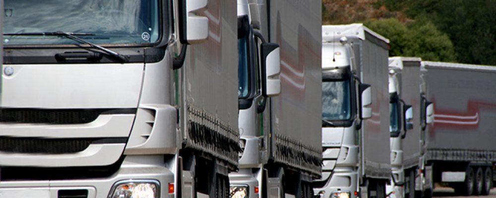 Silver Trucks Convoy of silver trucks appproaching at viever